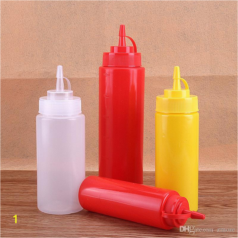 Plastic squeeze bottle dispenser with cap Used as sauce oil vinegar ketchup mustard mayonnaise dispenser Great for restaurant and home kitchen use