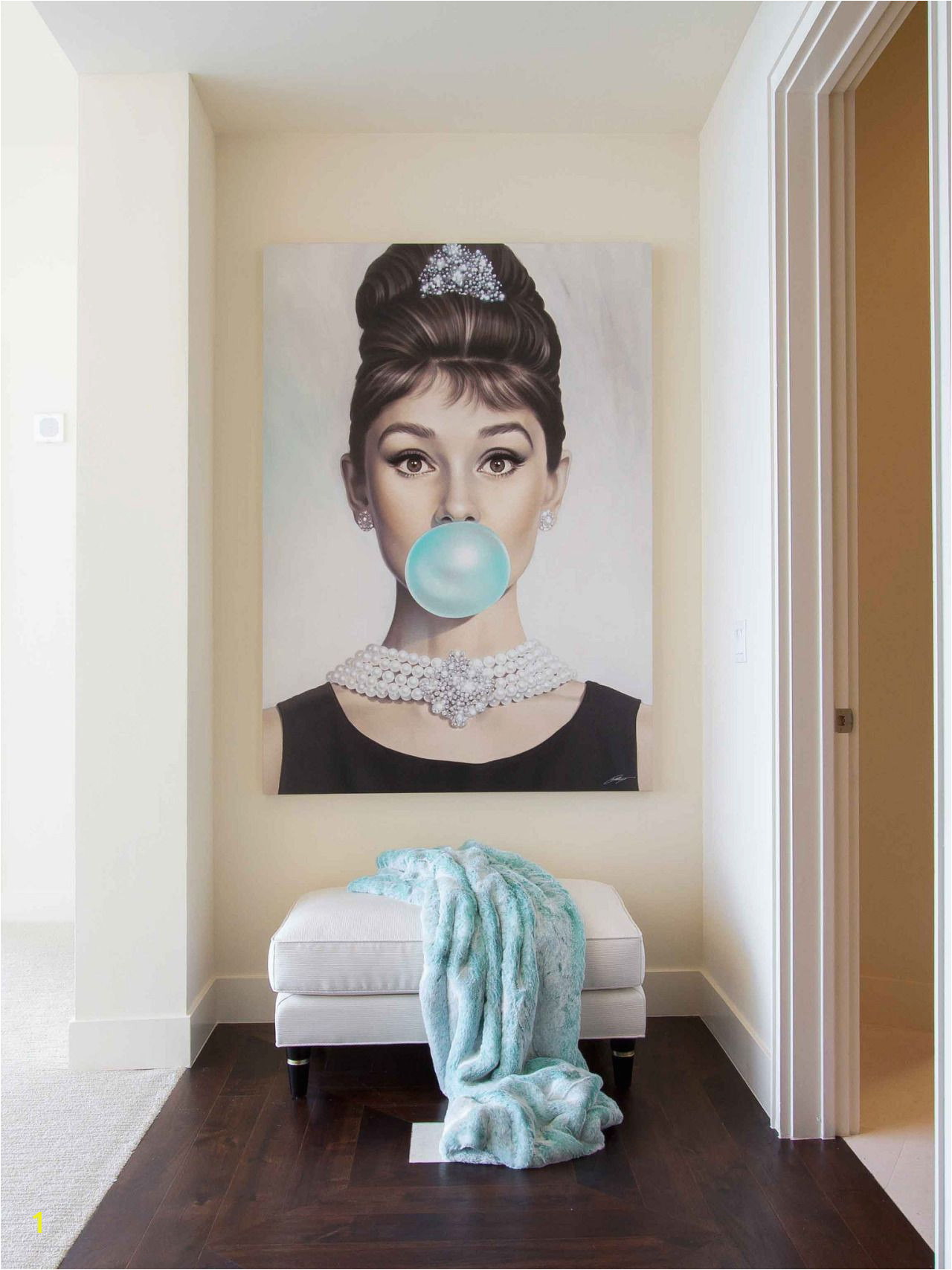 Audrey Hepburn artwork at the end of the hall Brilliance