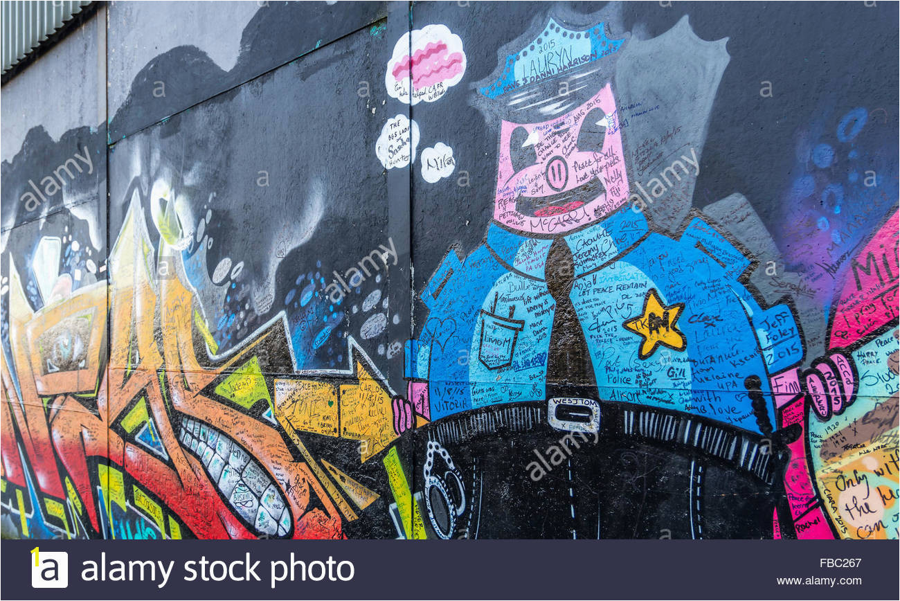 Close up of the main Belfast peace wall dividing Shankill and Falls Road s Stock Image