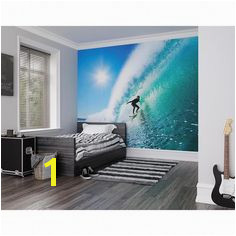 The soothing blue tones and ener ic surfing scene of the ohpopsi Adrenalin Wall Mural bring a touch of sun soaked life to your wall