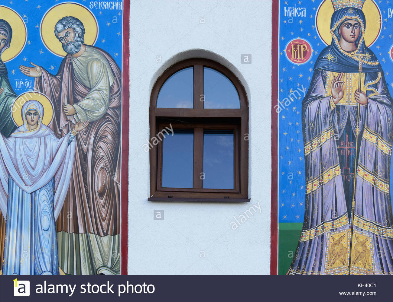 New murals on wall of new church Romania Stock Image