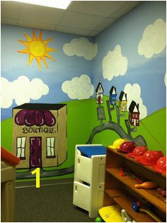 Another section of the church nursery mural with little houses and boutique To hire me