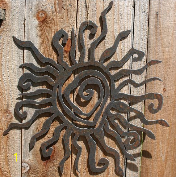 This rustic sun measures 30 in diameter and is quite the statement piece Cut from recycled steel no two pieces look alike Hang it outside in your garden