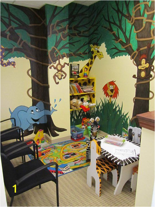 Children love the wall murals reading and playing with educational toys at Premier Wellness Chiropractic while they wait for their adjustment or wait for