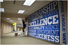 Trust the local sign experts at Pensacola Sign to encapsulate your space with bold branded environmental graphics wall murals and architectural signs and