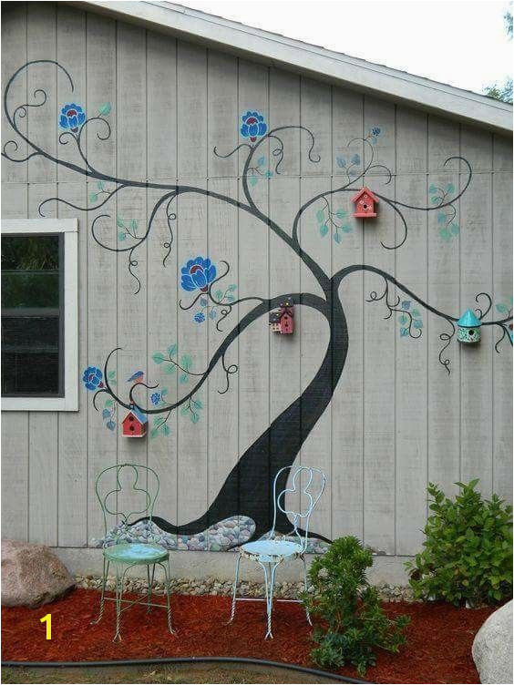 Tree mural brightens exterior wall of outbuilding or home Painted Shed Painted Garage Walls