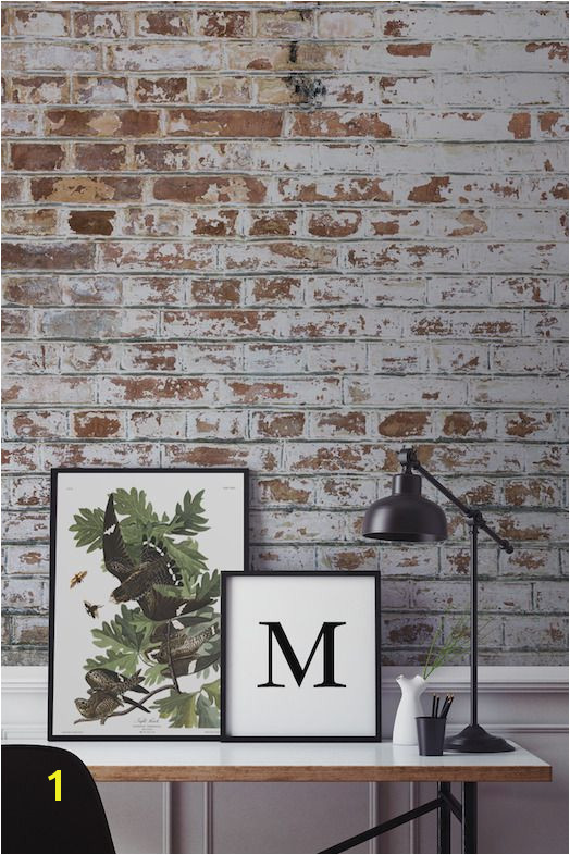 A realistic brick wallpaper like this from Murals Wallpaper can give your home that rough luxe look with no fuss at hall