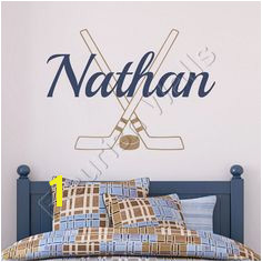 Items similar to Hockey Wall Decal Personalized With Name Hockey Sticks And Hockey Puck Athletic Sports Vinyl Wall Decal Boys Room Wall Art BN027 on Etsy