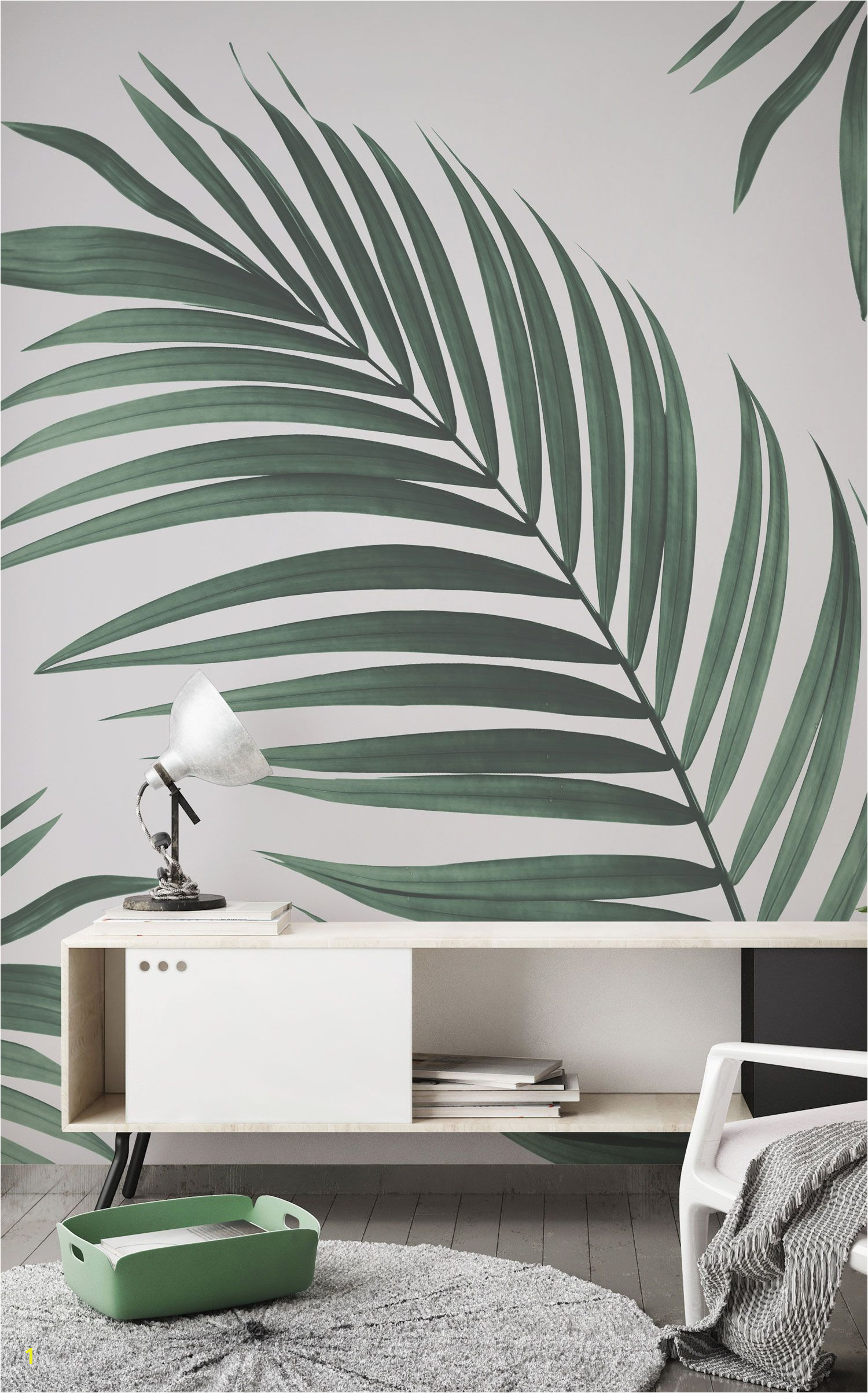 Falling in love with greenery This jungle wallpaper is another great way to incorporate life into your home Lovely faded green tones of the palm against a