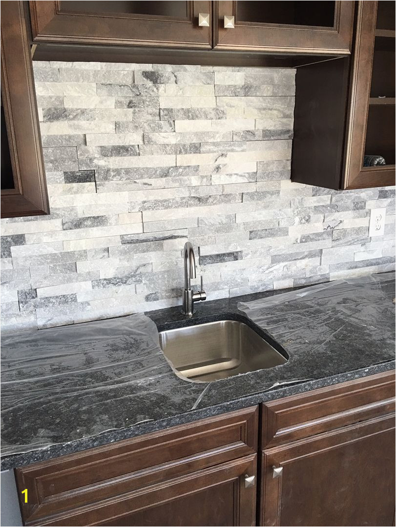 Stacked stone is a great wet bar backsplash