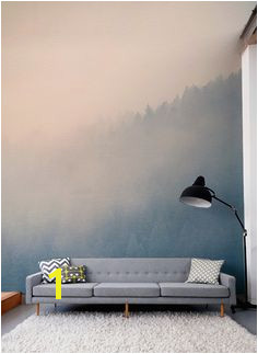 Gaze across the treetops with the beautifully hazy forest wall mural Soft pastels colour make Forest WallpaperRoom