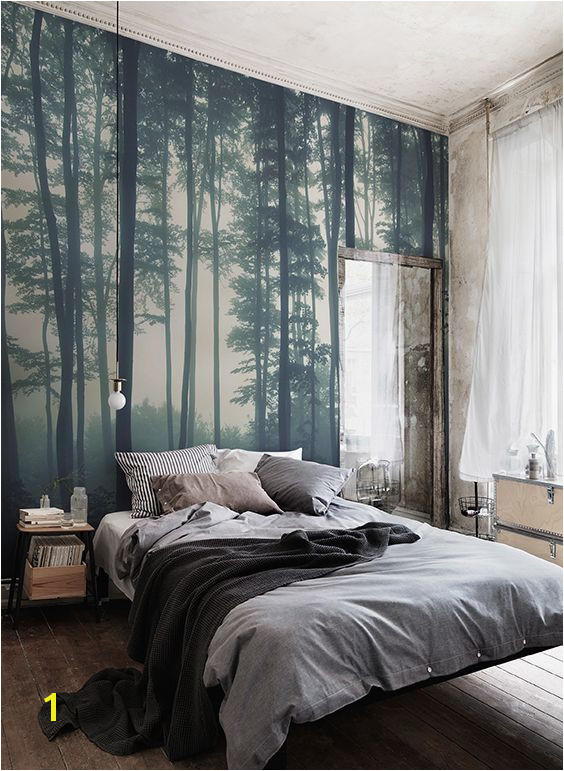 Discover calming interior design with a moody forest wallpaper Featuring a sea of trees in deep misty hues this wallpaper can transform any room into a