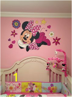 Minnie Mouse mural in baby nursery