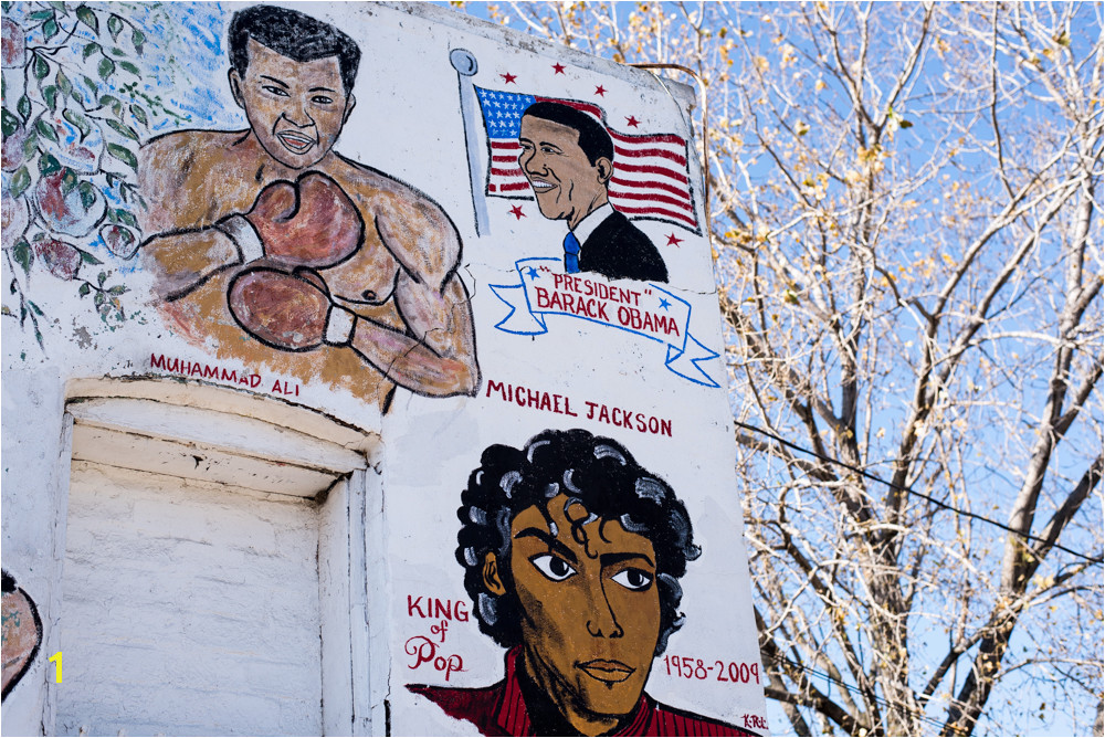 a newer corner of the Wall of Respect President Obama s portrait is flanked by depictions of Muhammad Ali and Michael Jackson