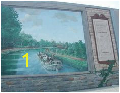 Mural of Erie Canal there are murals throughout the village of Lyons of Erie Flood WallErie