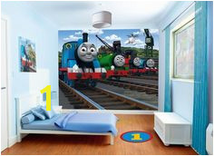 The Thomas the Tank Engine Walltastic is a 12 piece wallpaper wall mural that brings the World of Thomas into your child s room