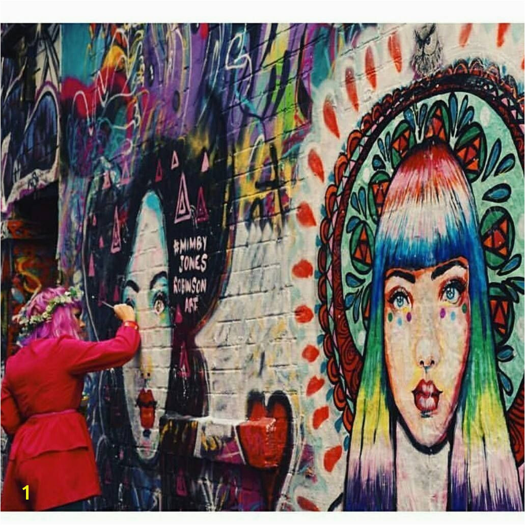 Mimby Jones Robinson painting her Goddess murals in Hosier Lane Melbourne graphy by Sophie Argiriou