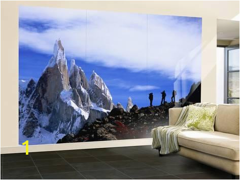 Hollywood Sign Wall Murals Wall Mural Hikers On A Ridge Dwarfed by Cerro torre