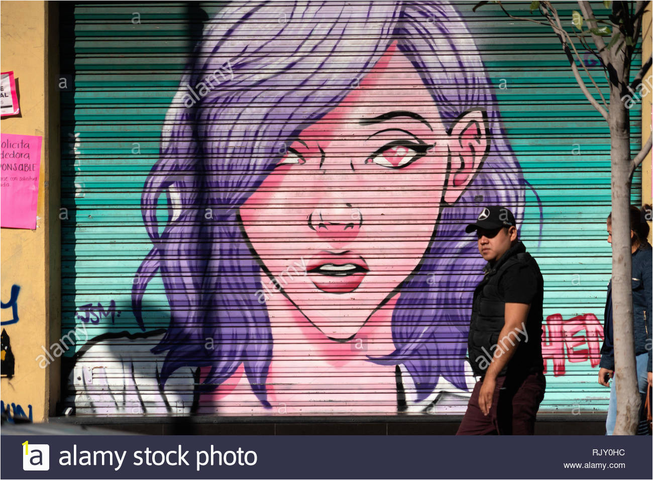 mexico city mexico january 30 2019 all the shops rolli down gates have graffiti in 20 november business street art is all over the capital and RJY0HC