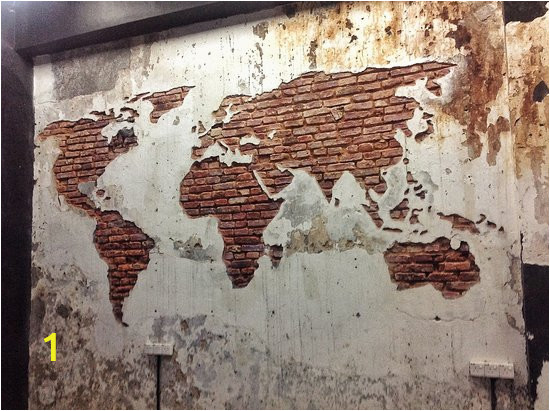 a world map carved into