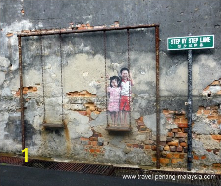 children on swing street art