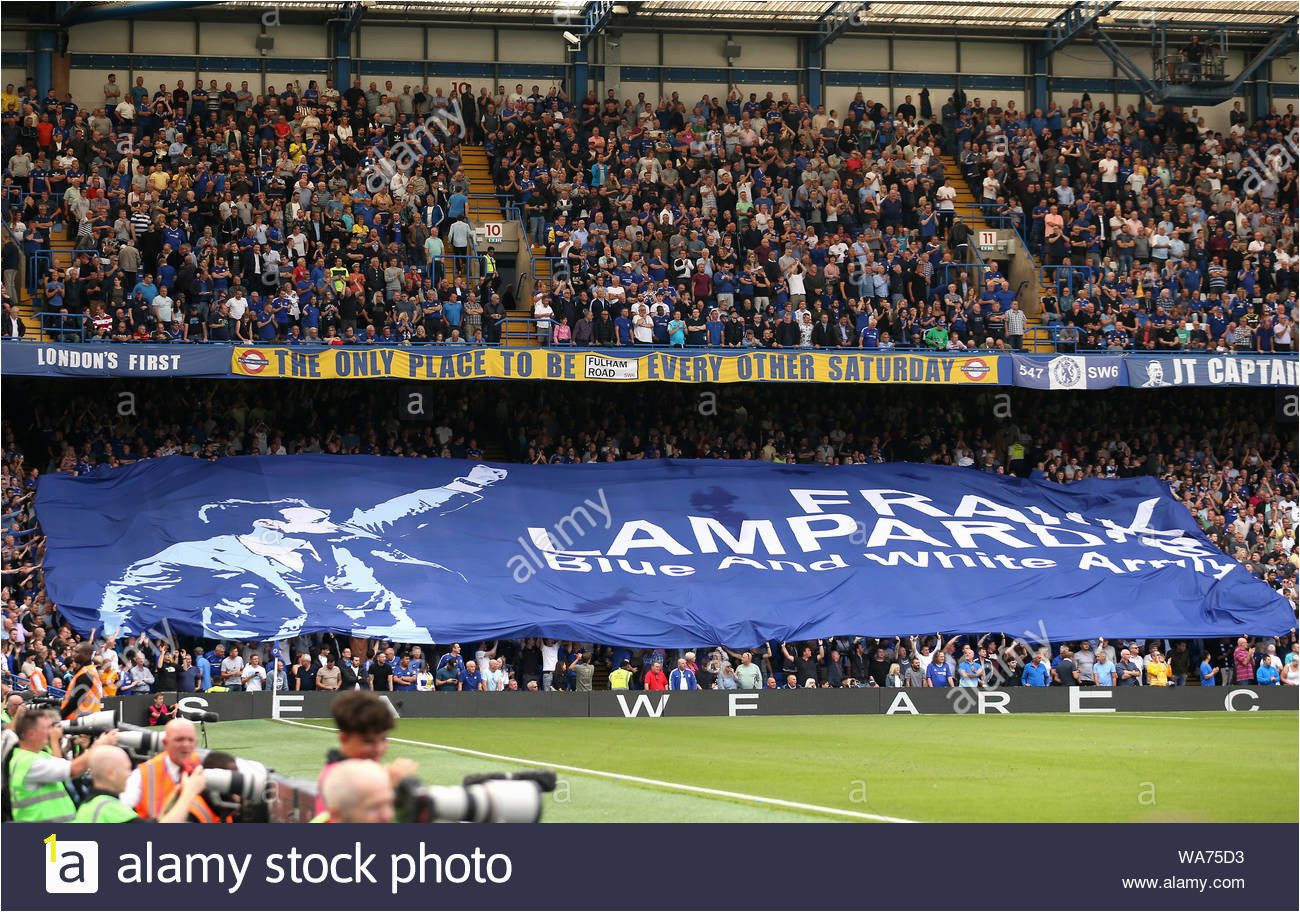 a banner celebrating chelsea manager frank lampard is pulled by fans prior to kick off during the premier league match at stamford bridge london WA75D3