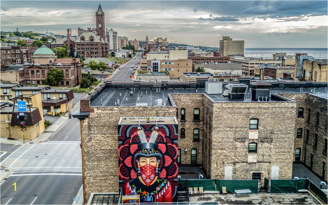 A mural of a Native American woman on the side of the Dr Robert Powless Cultural Center at the American Indian munity Housing Organization dominates the streetscape on West Second Street in Duluth on Friday evening The mural was created by artists Votan Ik and Derek Brown Clint Austin caustin duluthnews