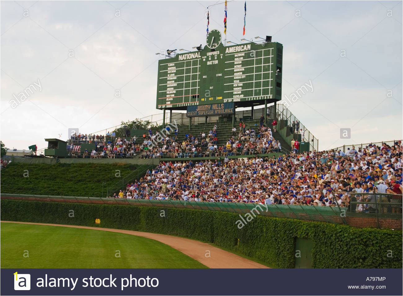 sports chicago illinois night game at wrigley field fans in bleachers A797MP