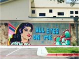 A Building Has A Mural Painted On An Outside Wall All Eyes On Cedar Park Vision Womeninoptometry