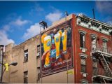 A Building Has A Mural Painted On An Outside Wall Blue Moon Painted Ad In Manhattan