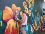 A Building Has A Mural Painted On An Outside Wall Visual Artist Tiffany Clark Has Created 100 Murals In Dayton