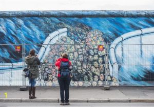 Berlin Wall Mural Kissing Berlin Installs A Security Fence to Protect East Side