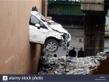 Car Crashing Through Wall Mural Crash Through Wall Stock S & Crash Through Wall Stock