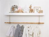 Mural Floating Shelf Hack Of A Standard White Floating Shelf to Add A Clothes Rail for