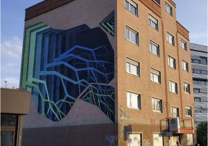 Pictures Of Murals On Buildings Street Artist Spray Paints Boring Buildings with Optical Illusions