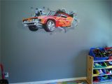 Race Car Wall Mural Hot Wheels Mural Of Car Crashing Through Wall Was Painted as