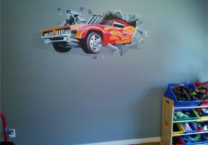 Race Car Wall Mural Hot Wheels Mural Of Car Crashing Through Wall Was Painted as