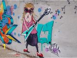 Rock Star Wall Murals Hd Wallpaper A Wall Painting Of A Fat Woman Wearing