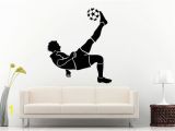 Sports Wall Murals Cheap soccer Game In Action Man athlete Doing A Scissor Bicycle