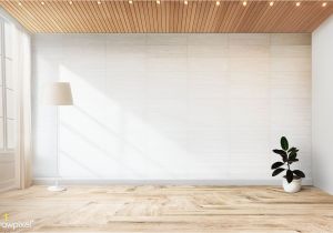 Wall Mural Mockup Free Lamp and A Plant In An Empty Room Wall Mockup